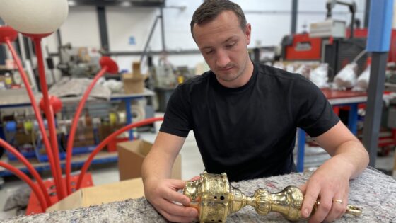 Michael Mulhall from Dernier & Hamlyn working on a light fitting in the workshop